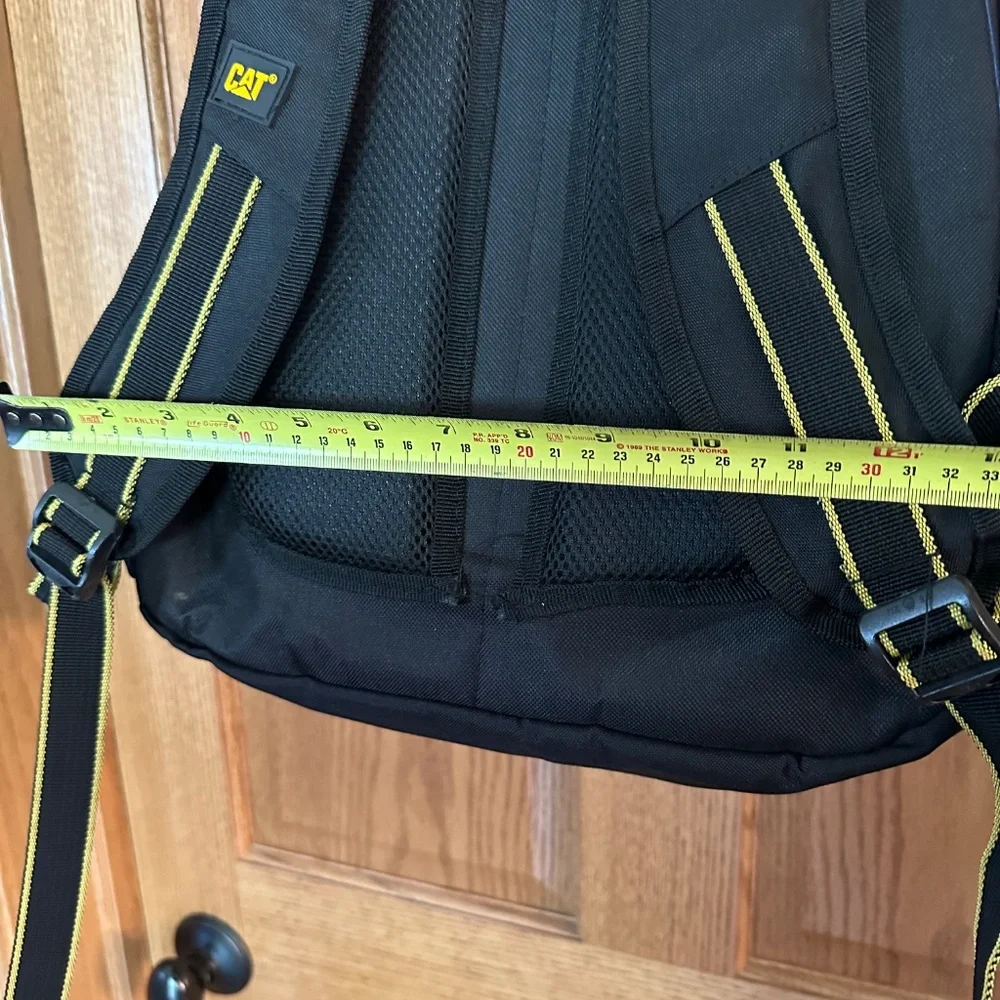 CAT brand black and gold backpack-new without tags